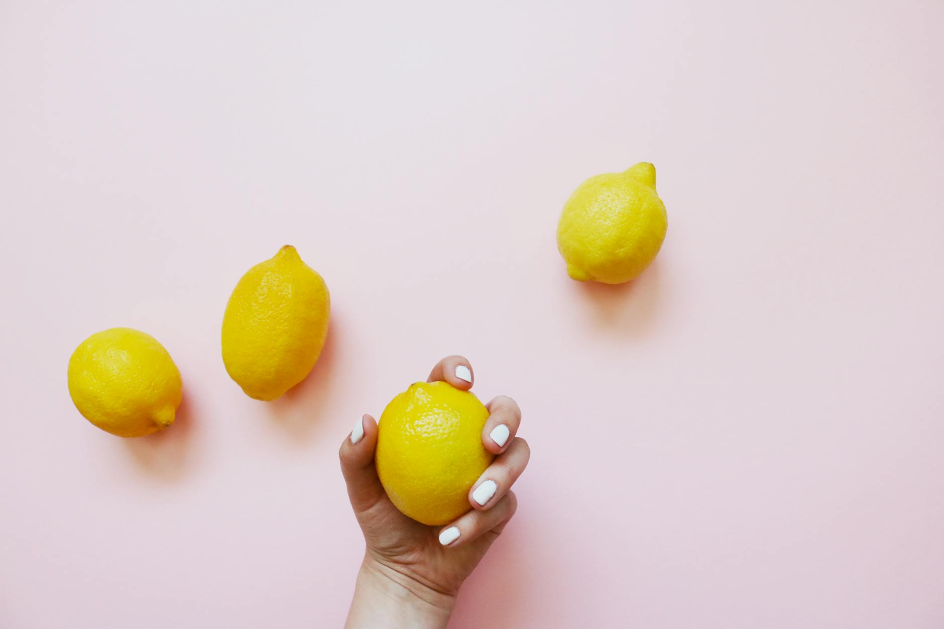 Hands holding soft silicone toys, representing pleasure and sexual wellness