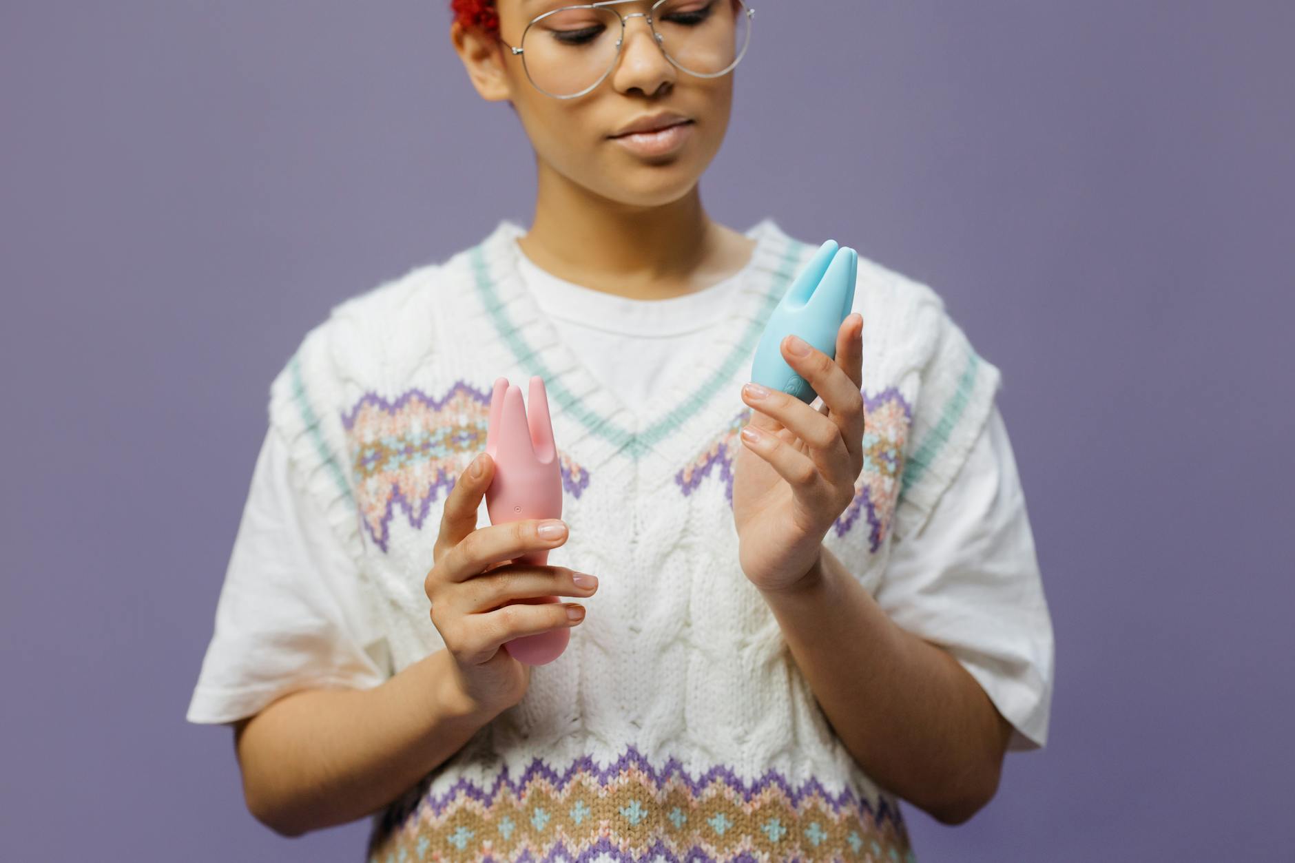 Colorful clitoral vibrators and adult toys arranged on a bright yellow background, symbolizing joy and shared pleasure.